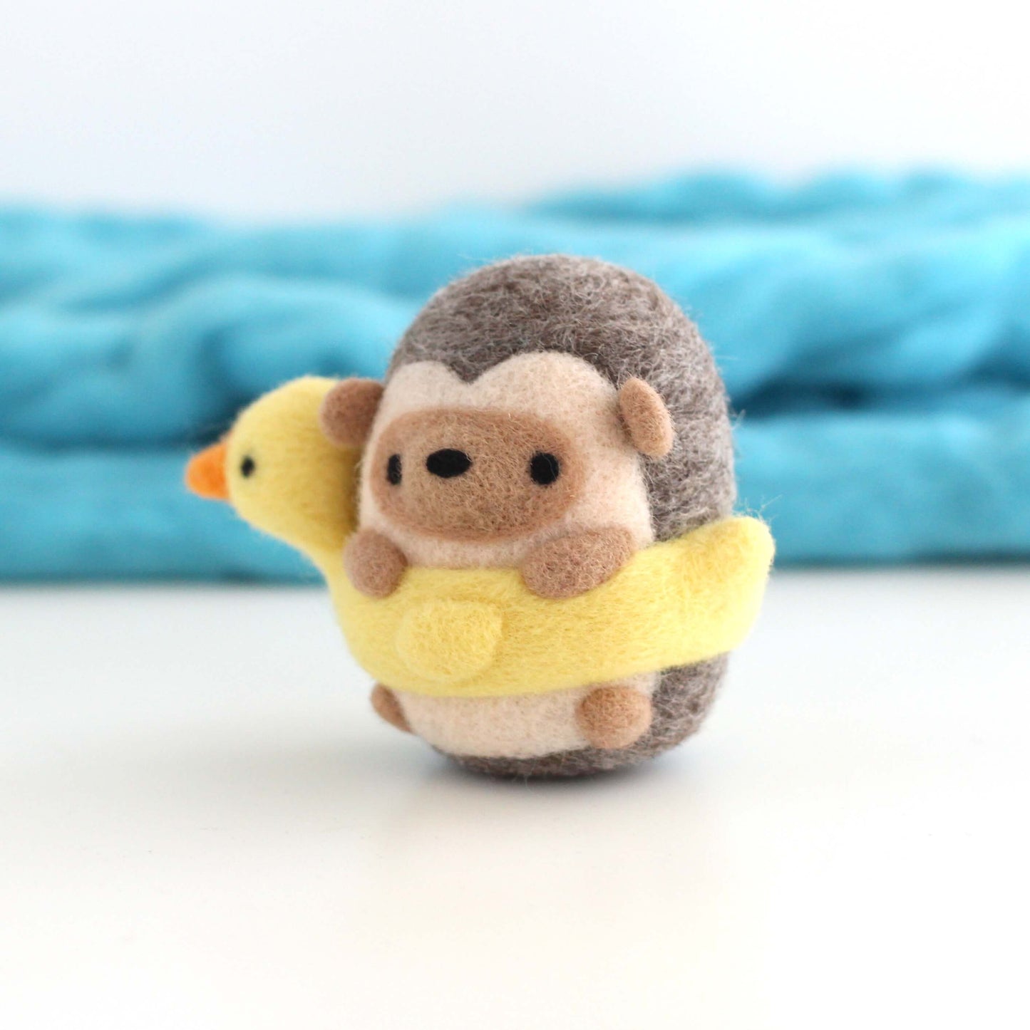 Needle Felted Hedgehog in a Duck Floatie