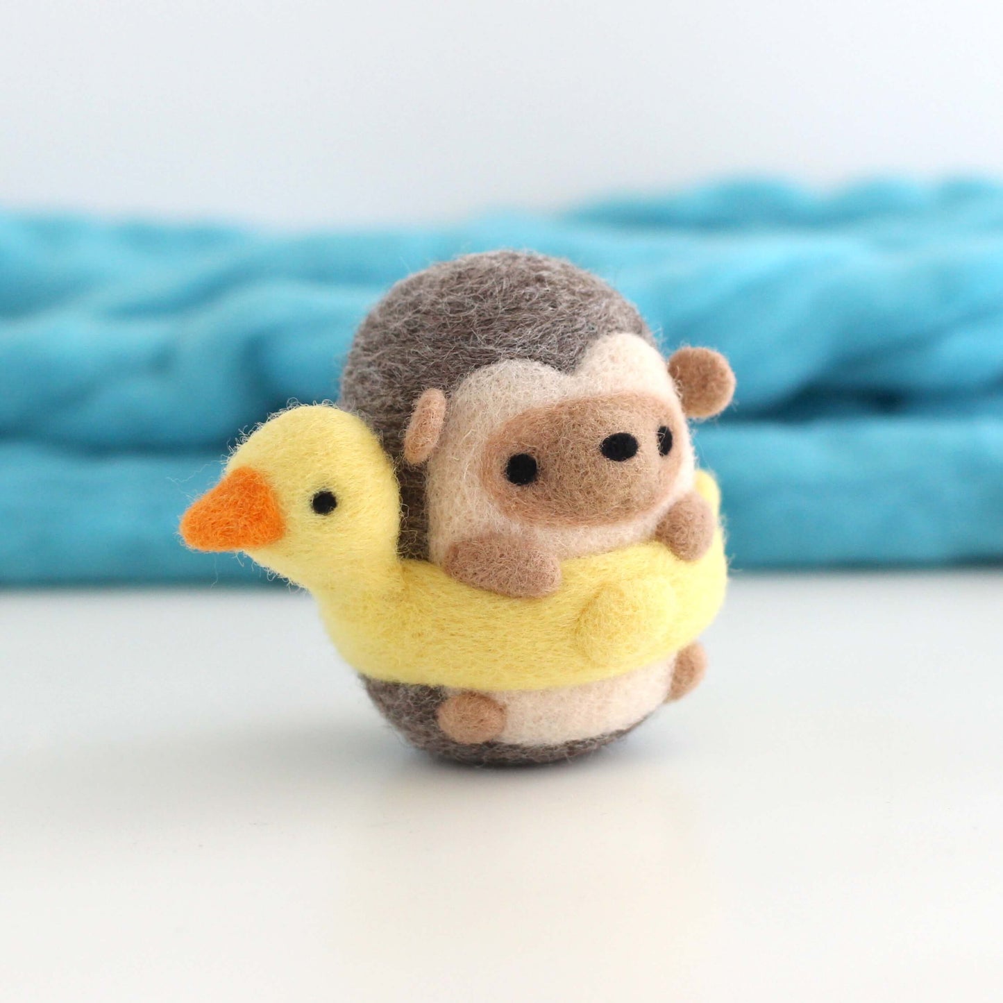 Needle Felted Hedgehog in a Duck Floatie