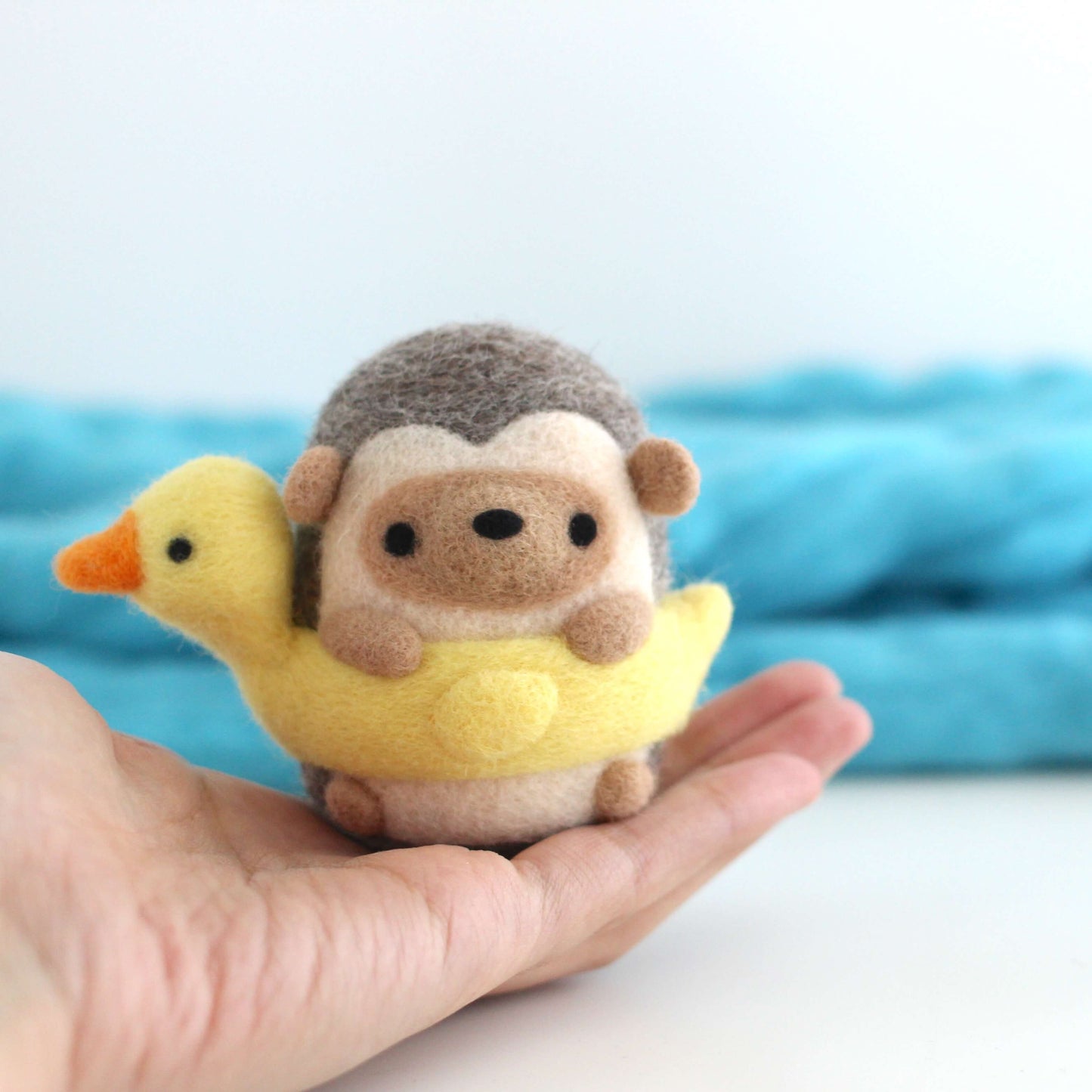 Needle Felted Hedgehog in a Duck Floatie