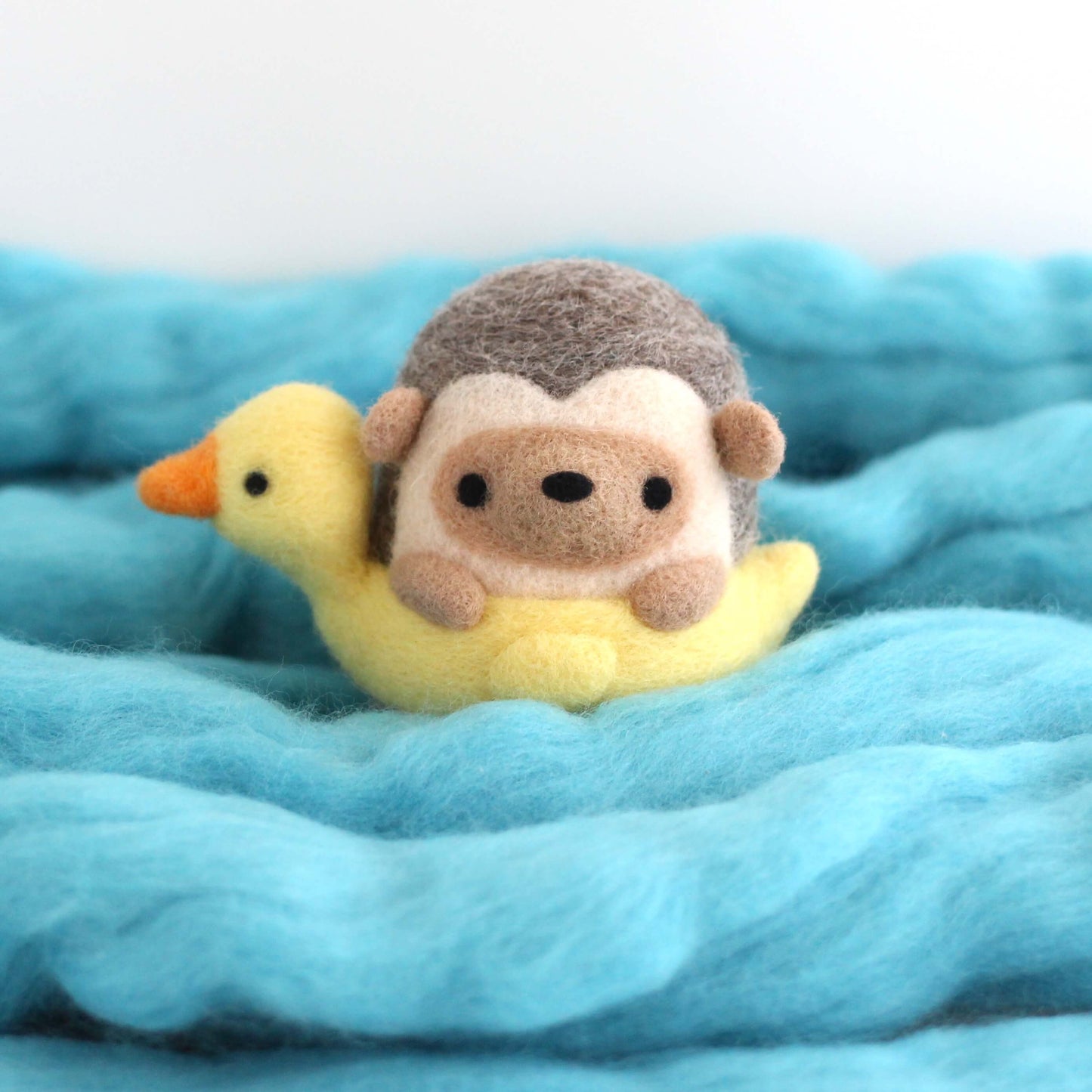 Needle Felted Hedgehog in a Duck Floatie