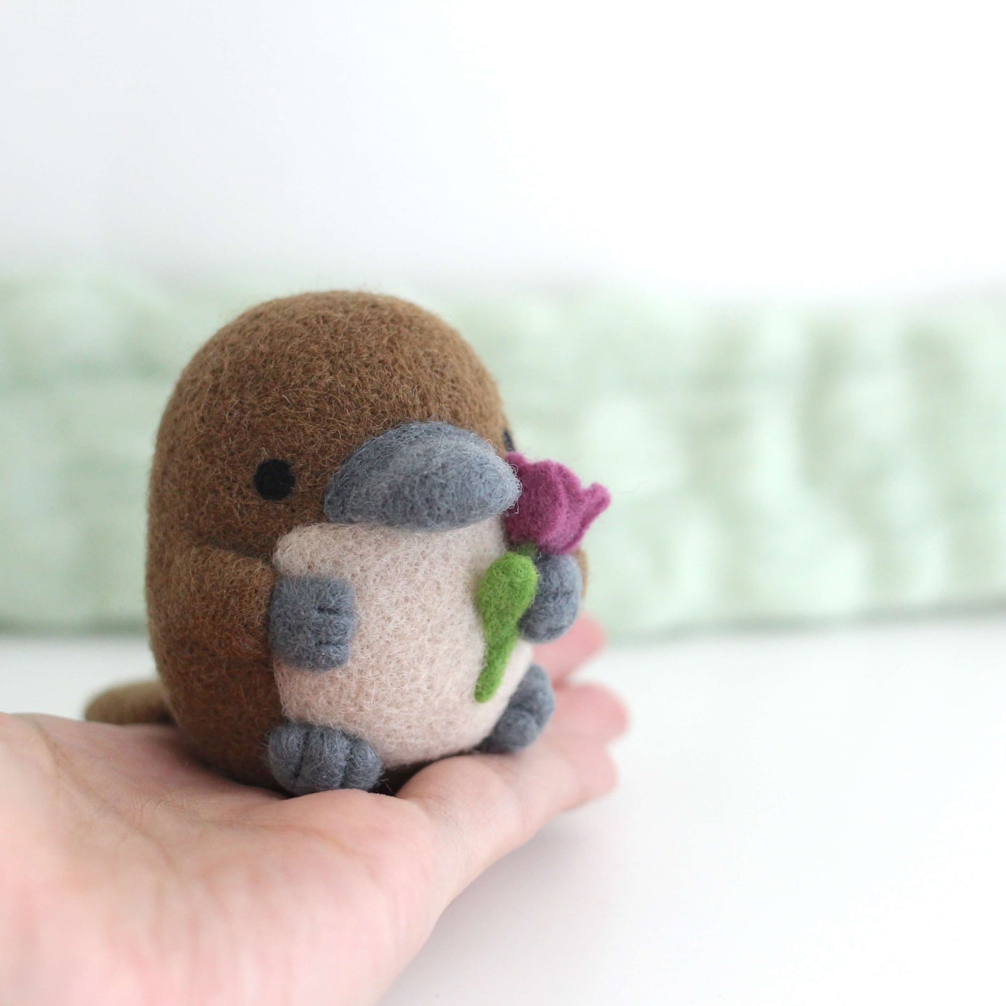 Needle Felted Platypus holding a Tulip (Fuchsia)