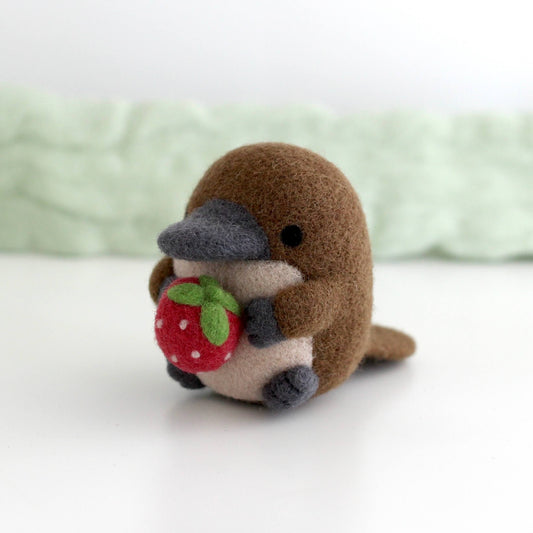 Needle Felted Platypus Holding Strawberry