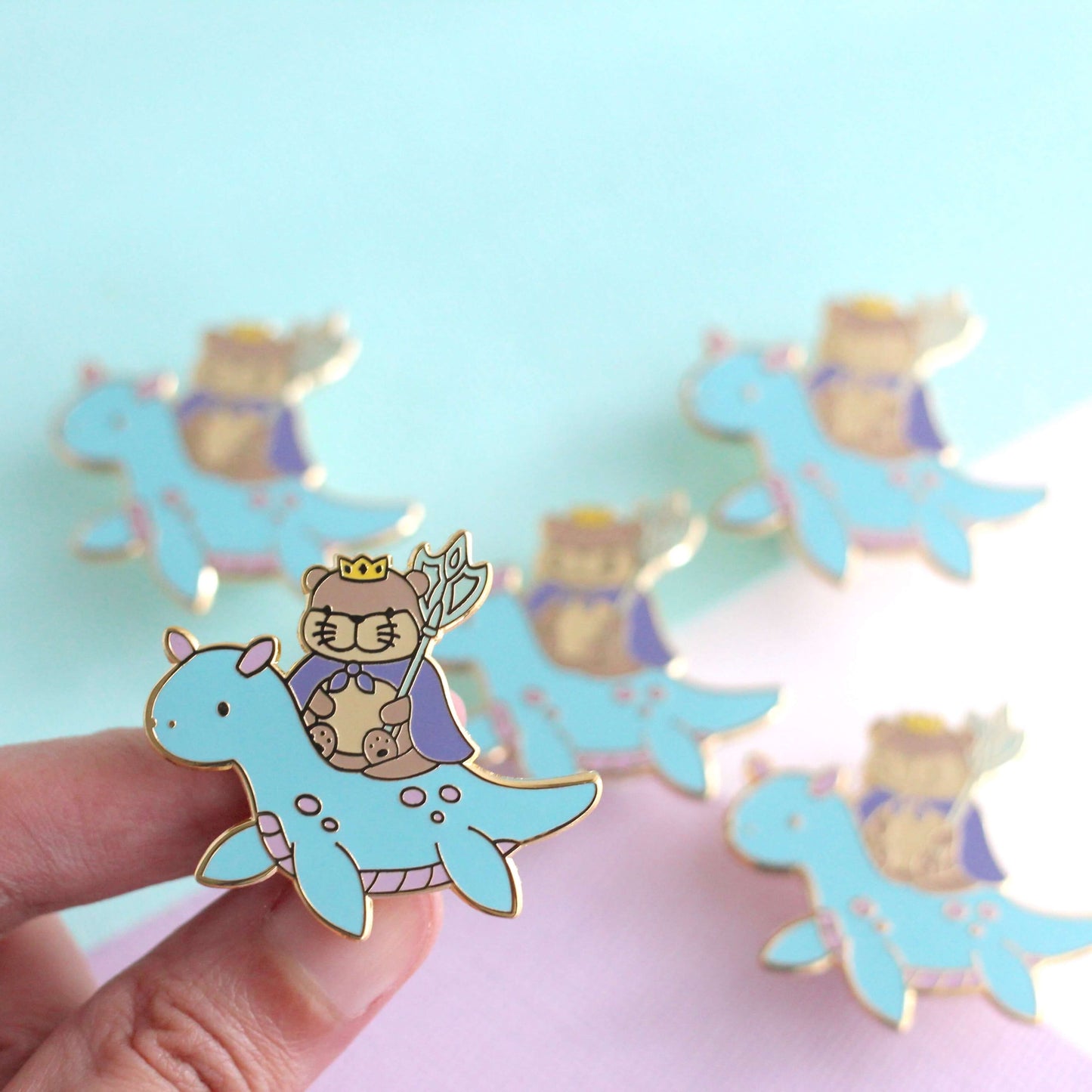 Otter King Riding Sea Dragon Enamel Pin (Light Blue Dragon Variant)