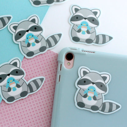 Raccoon holding Blue Bird Vinyl Sticker - Trash Panda Decal