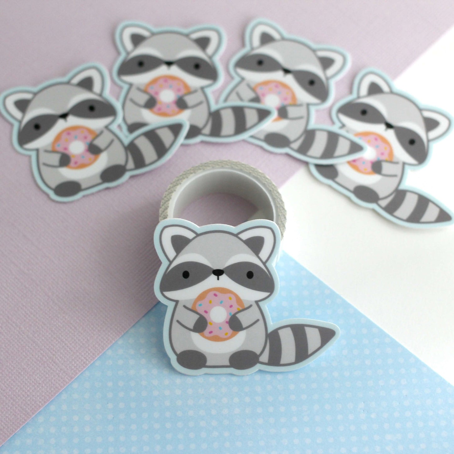 Raccoon holding Donut Vinyl Sticker