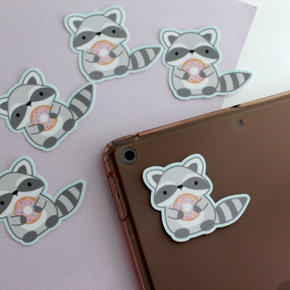 Raccoon holding Donut Vinyl Sticker