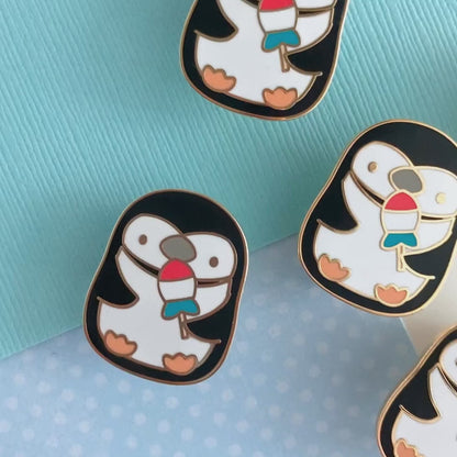 Chinstrap Penguin Holding Rocket Fish Ice Pop Enamel Pin