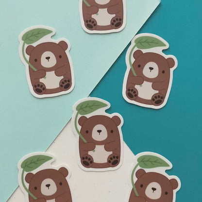 Brown Bear with Leaf Umbrella Vinyl Sticker. Laptop and Phone Decal