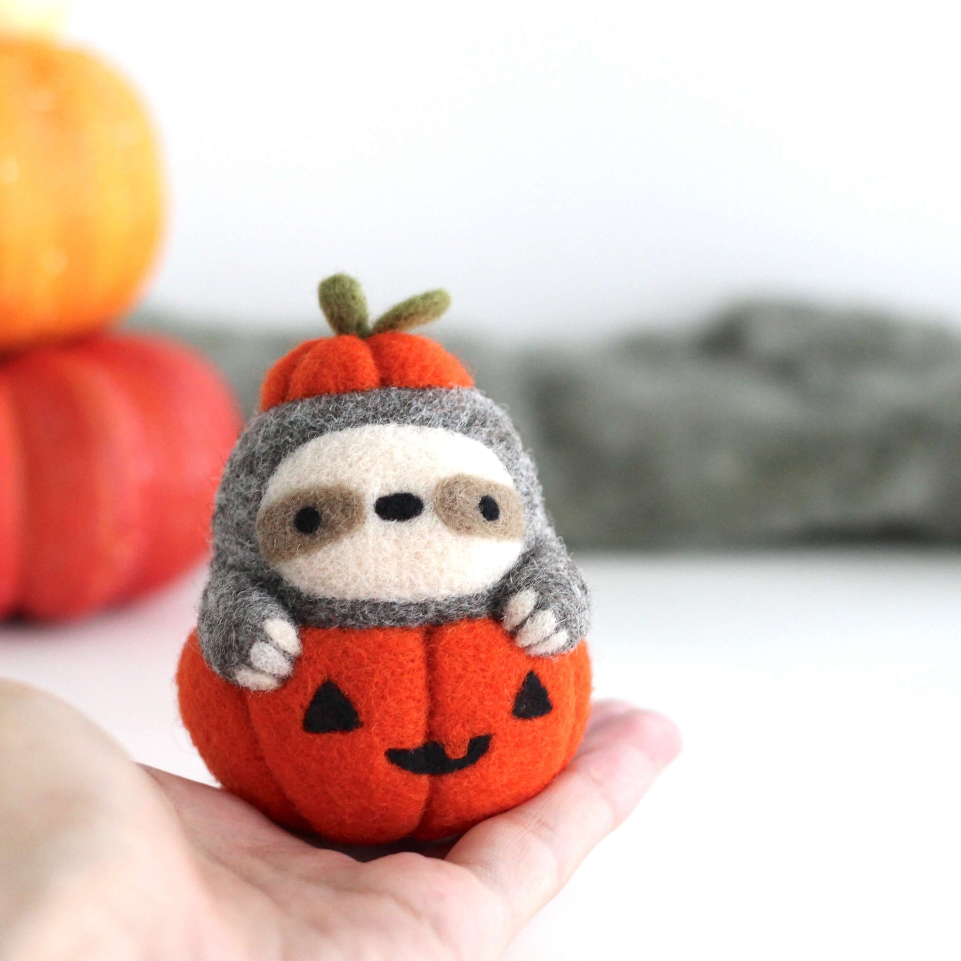 Wild Whimsy Woolies - Pumpkin Sloth Pin - Halloween - Jack-o'-Lantern
