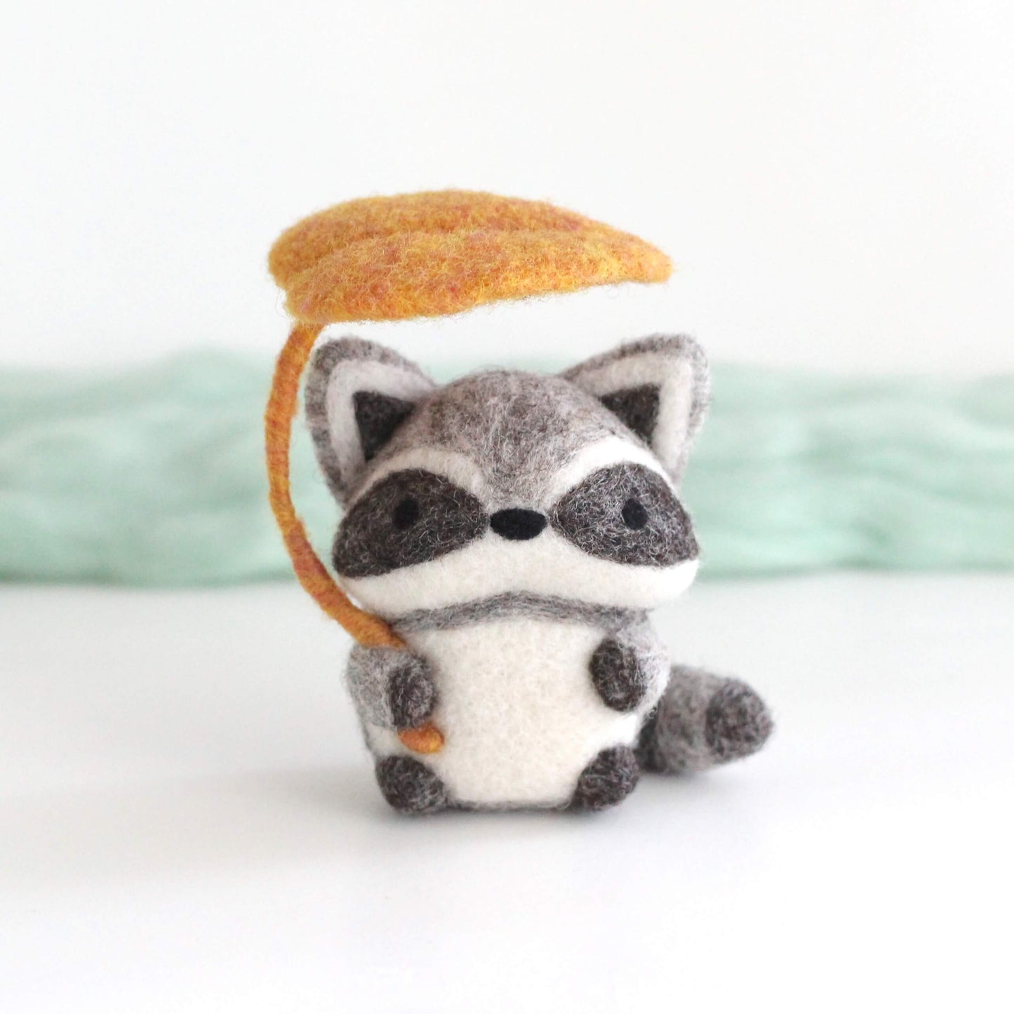 Needle Felted Raccoon Holding Leaf Umbrella