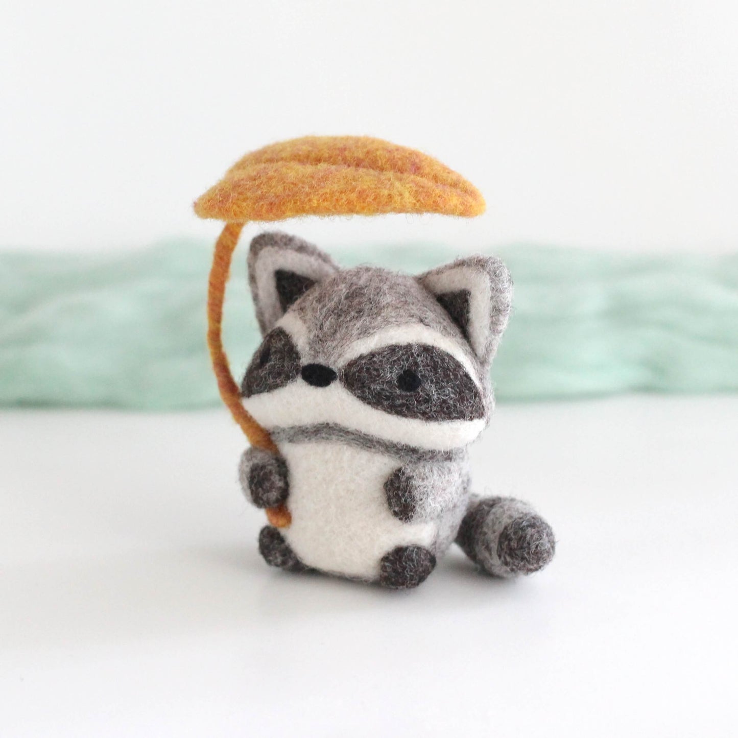 Needle Felted Raccoon Holding Leaf Umbrella