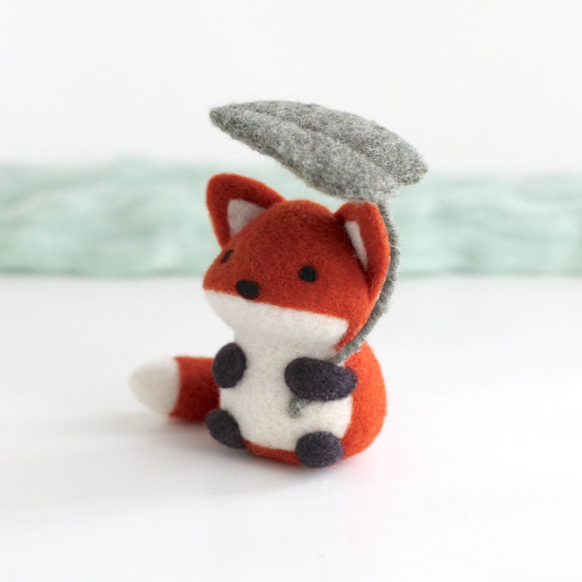 Needle Felted Fox Holding Green Leaf Umbrella by Wild Whimsy Woolies