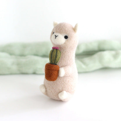 Needle Felted Alpaca holding Cactus