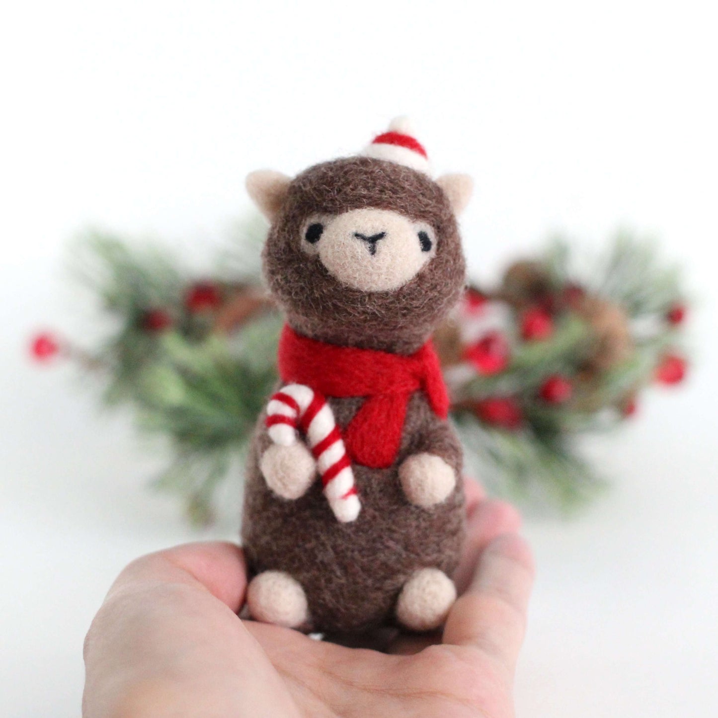 Needle Felted Alpaca holding Candy Cane by Wild Whimsy Woolies