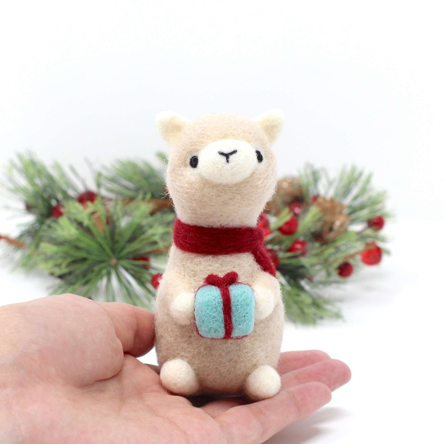 Needle Felted Alpaca holding Christmas Gift by Wild Whimsy Woolies