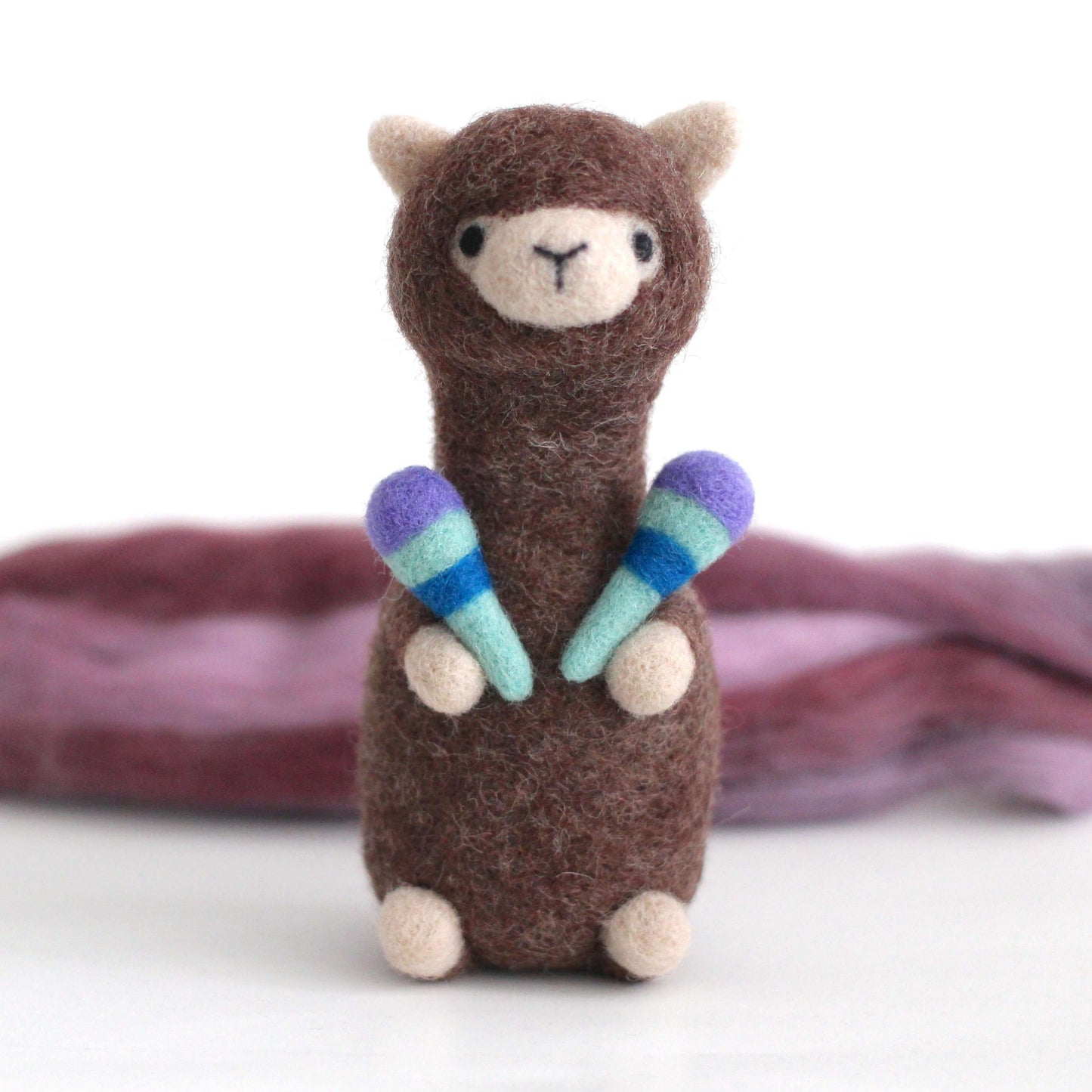 Needle Felted Alpaca holding Maracas by Wild Whimsy Woolies