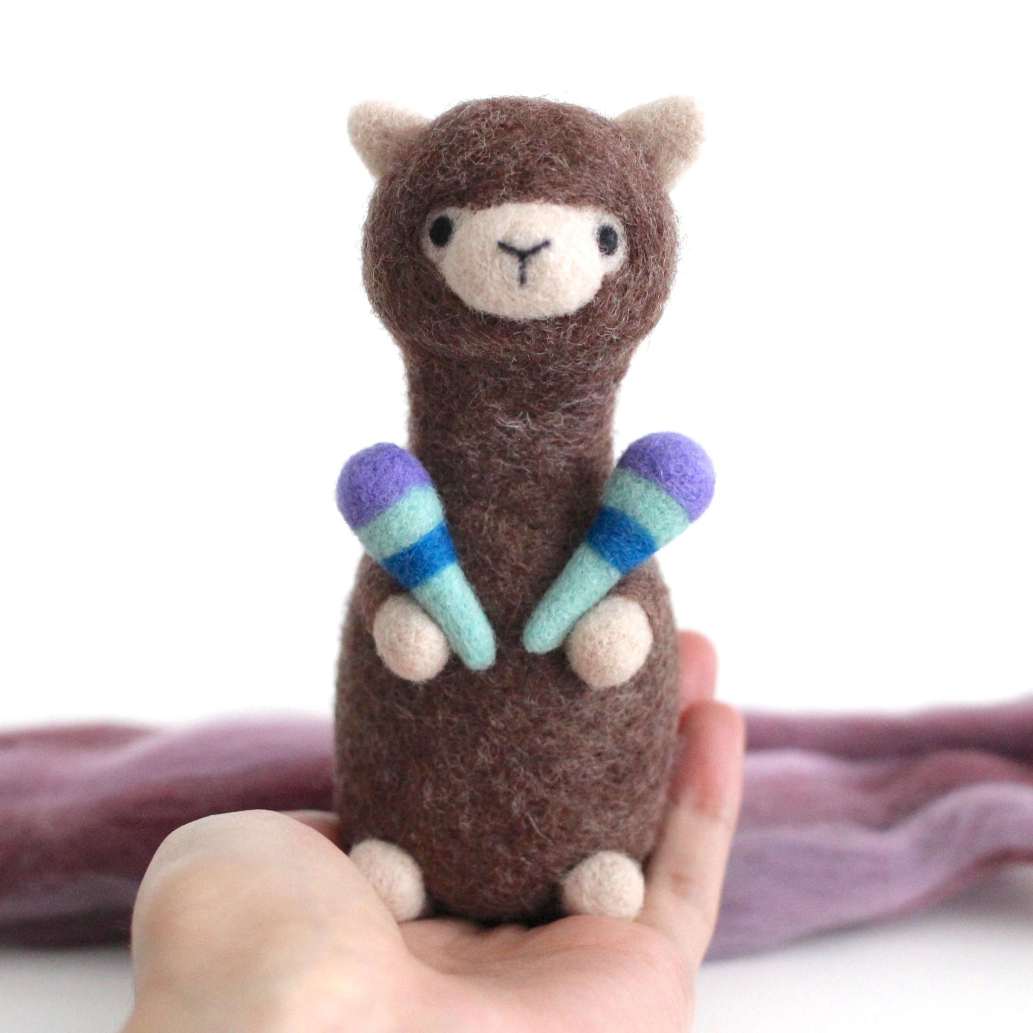 Needle Felted Alpaca holding Maracas Wild Whimsy Woolies