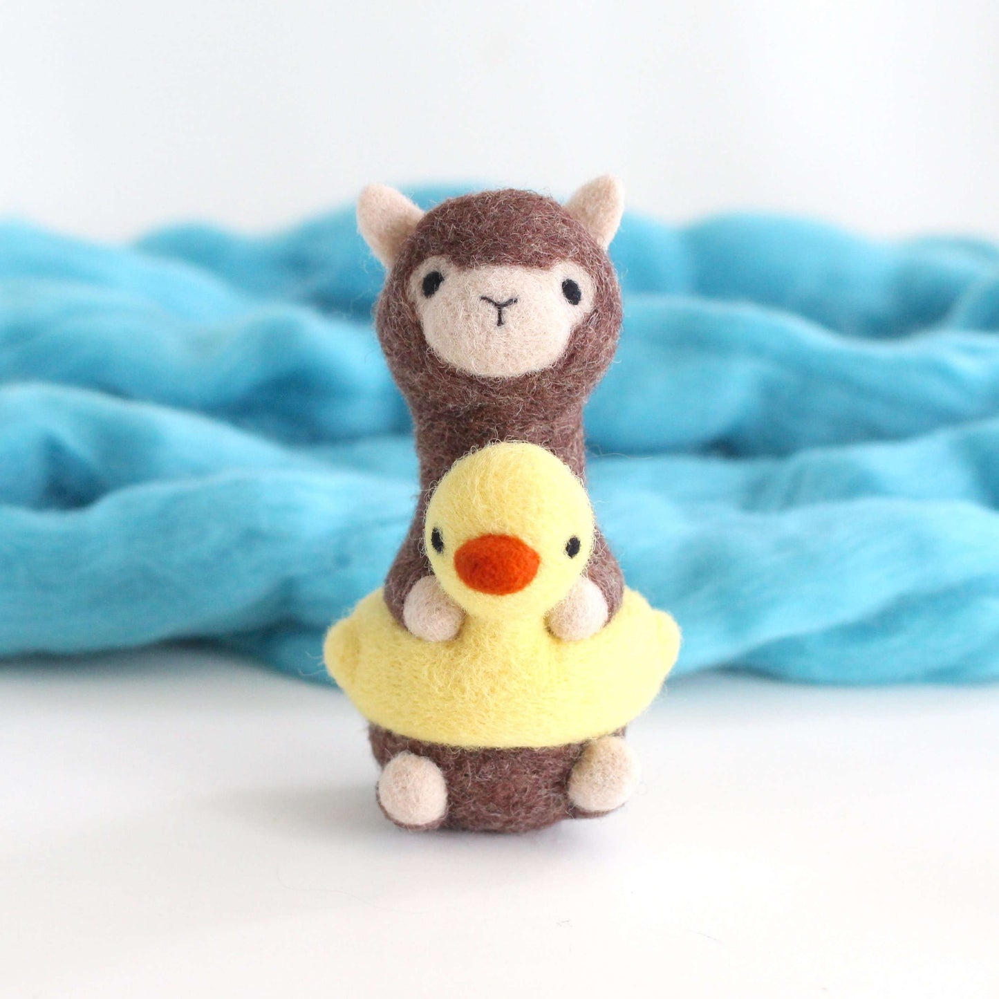 Needle Felted Alpaca in a Duck Floatie