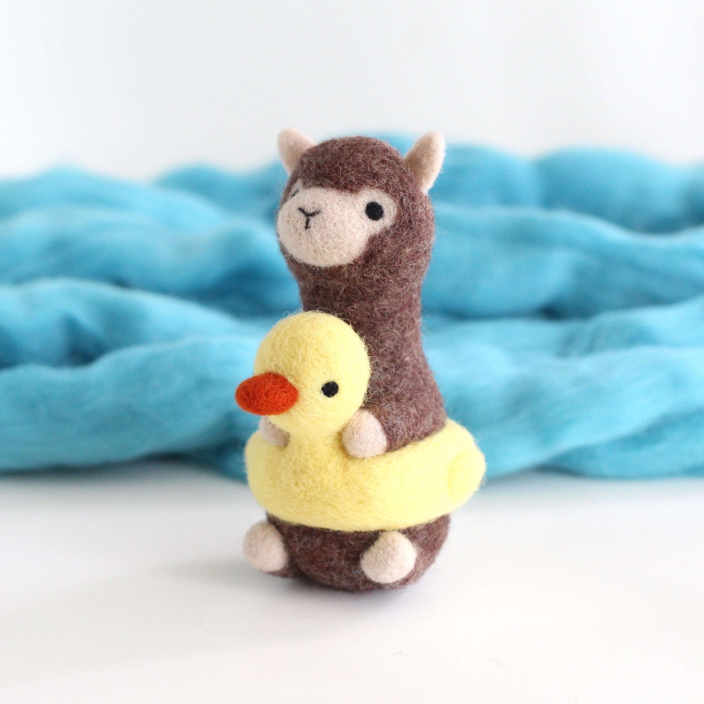 Needle Felted Alpaca in a Duck Floatie