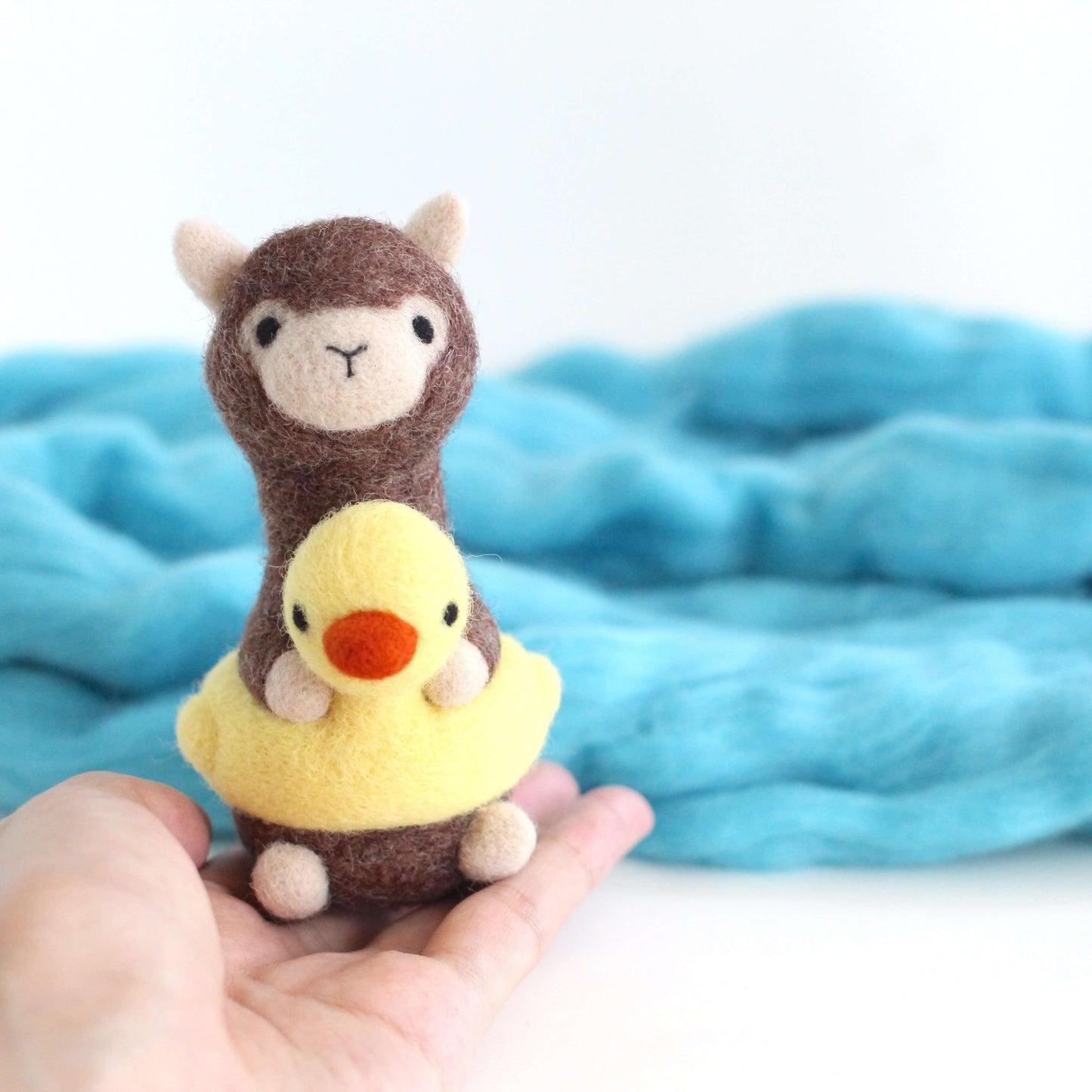 Needle Felted Alpaca in a Duck Floatie