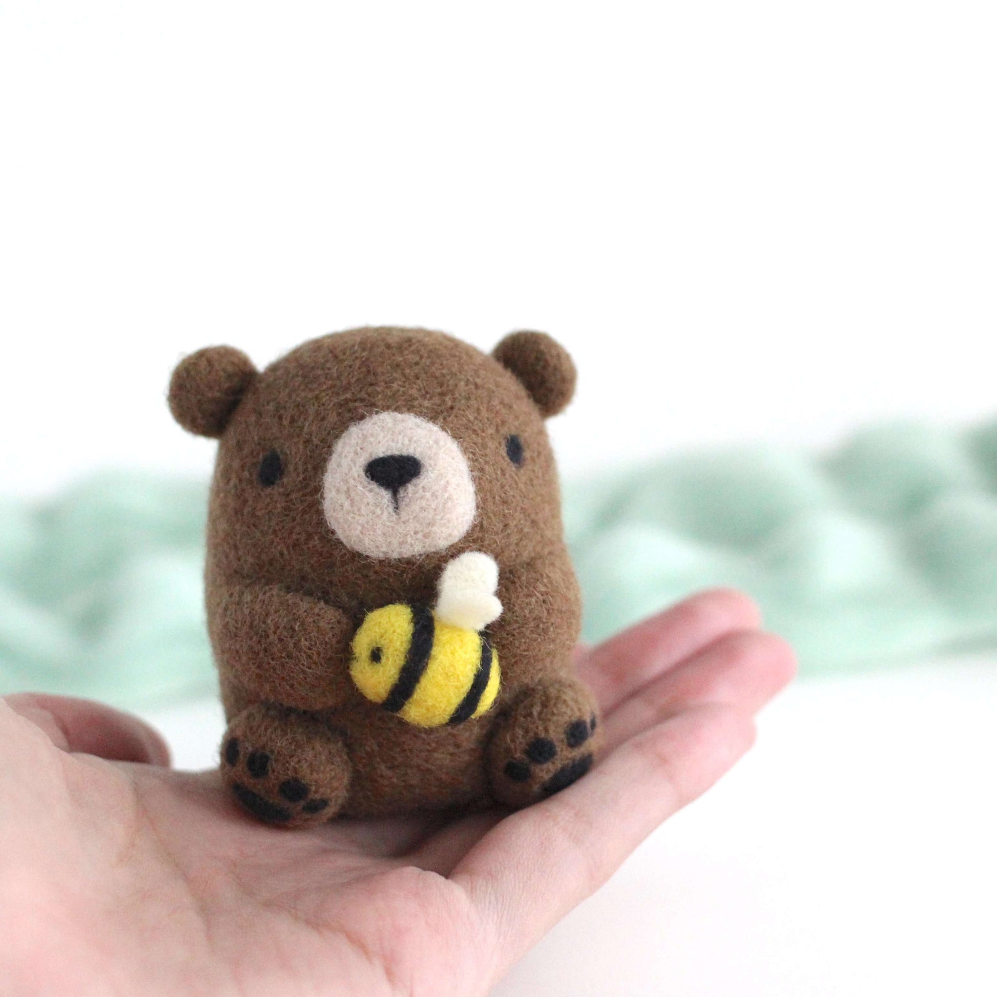 Needle Felted Brown Bear holding Bee by Wild Whimsy Woolies