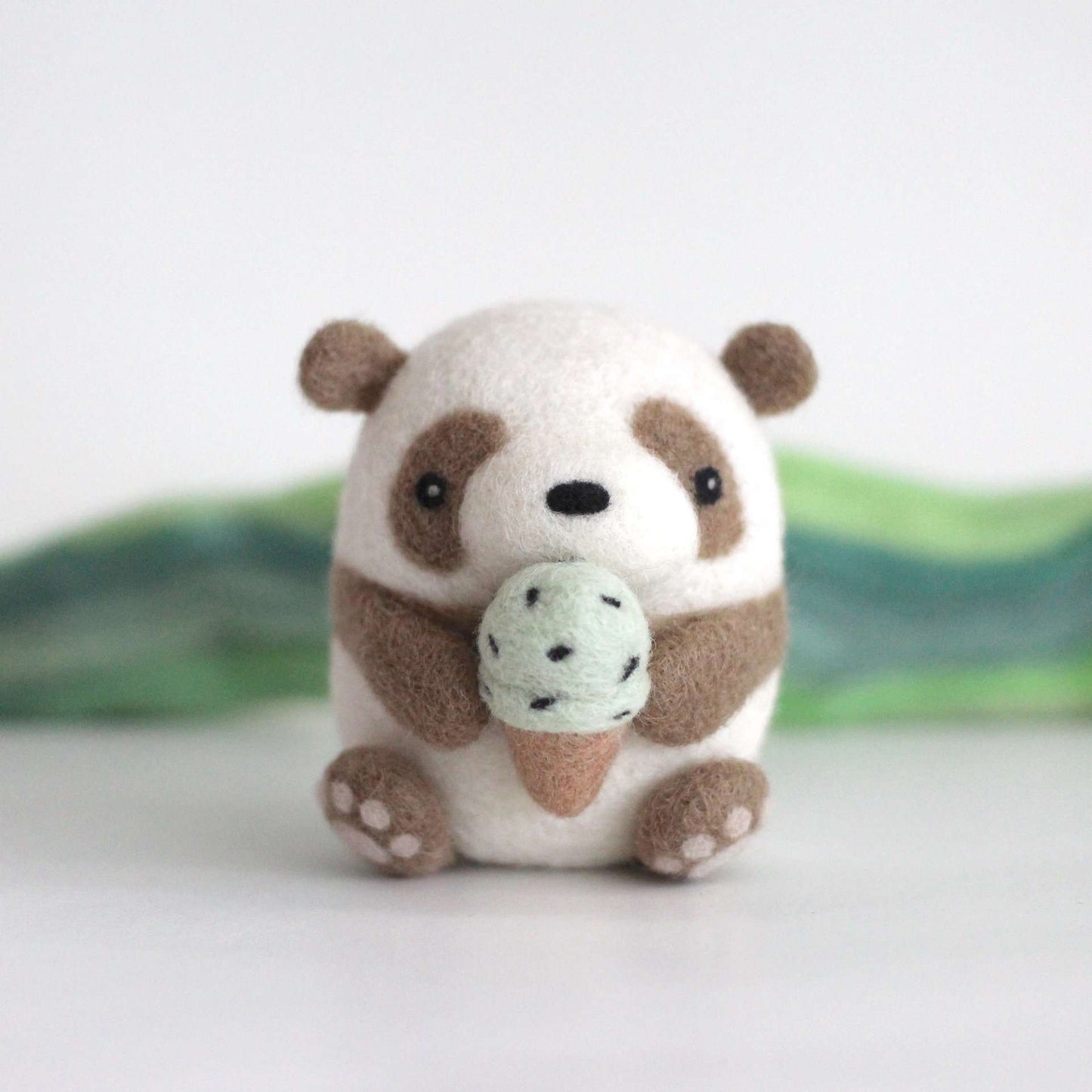 Needle Felted Brown Panda holding Ice Cream