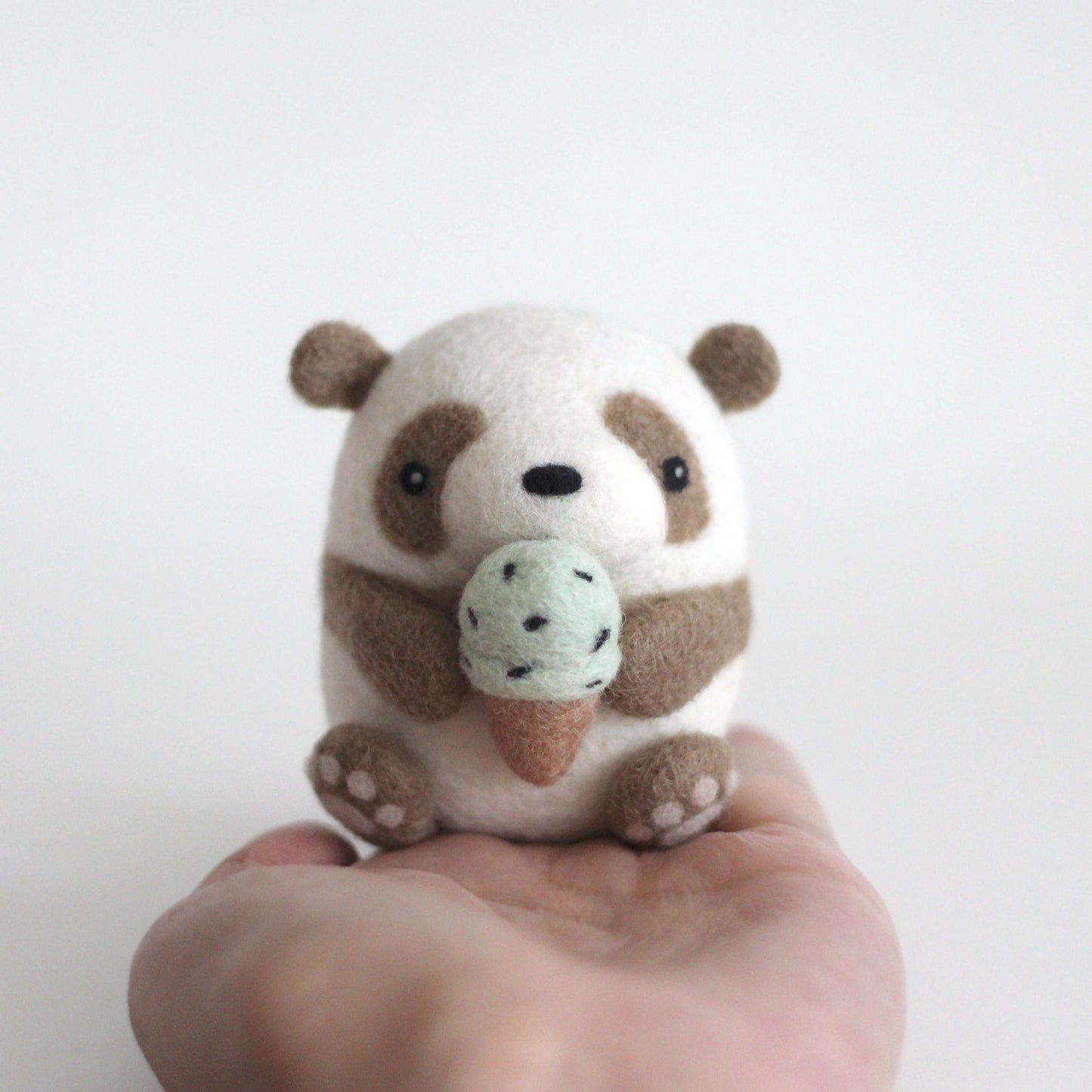 Needle Felted Brown Panda holding Ice Cream