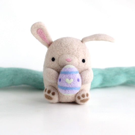 Needle Felted Bunny holding an Easter egg