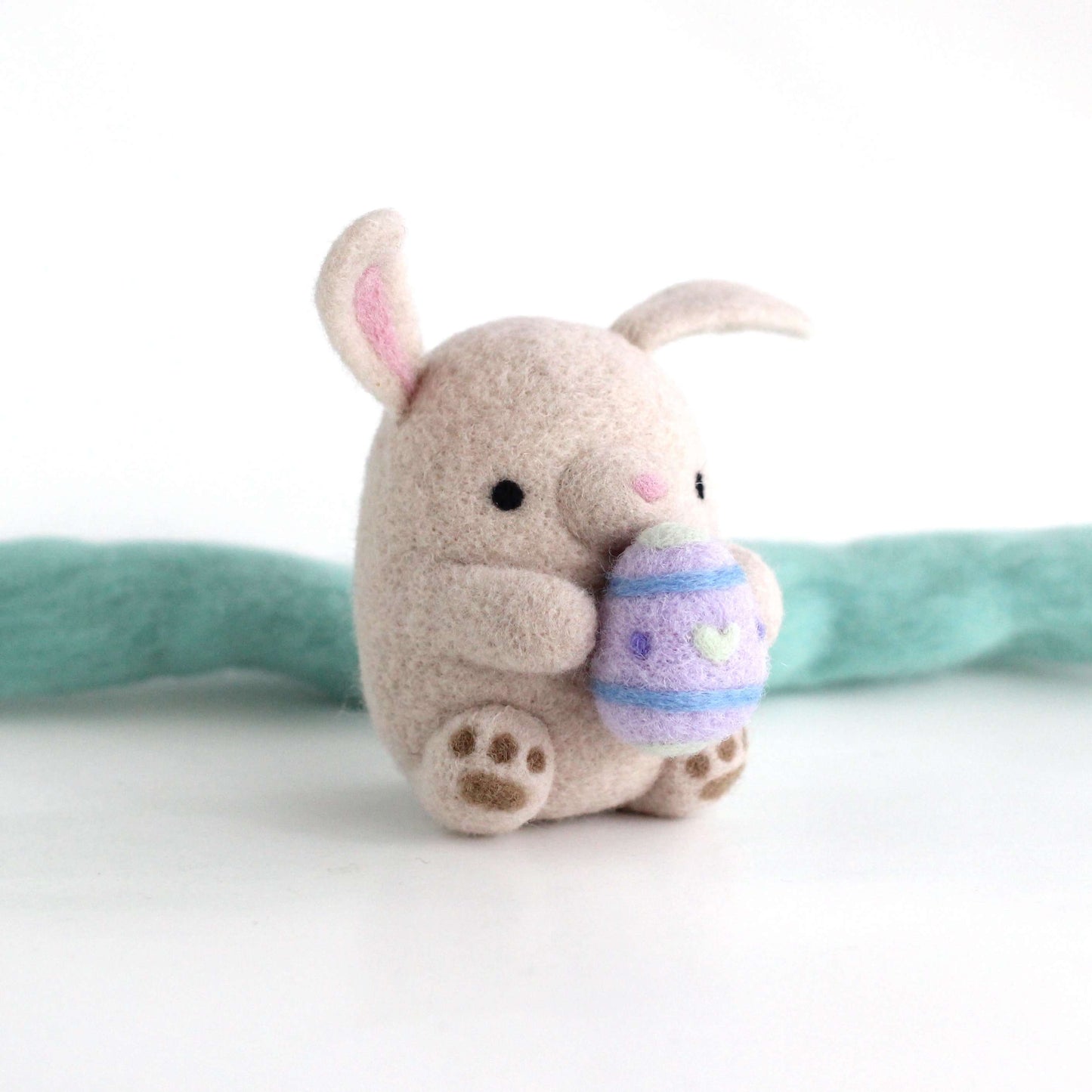 Needle Felted Bunny holding an Easter egg