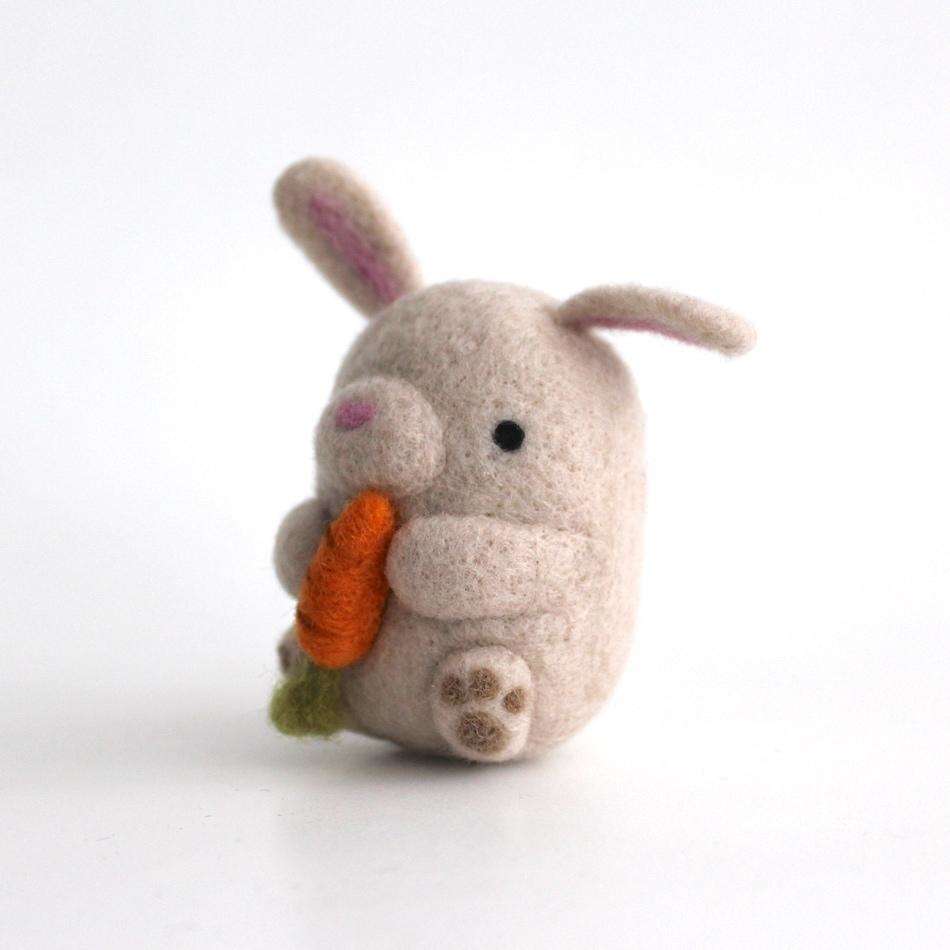 Needle Felted Bunny holding Carrot