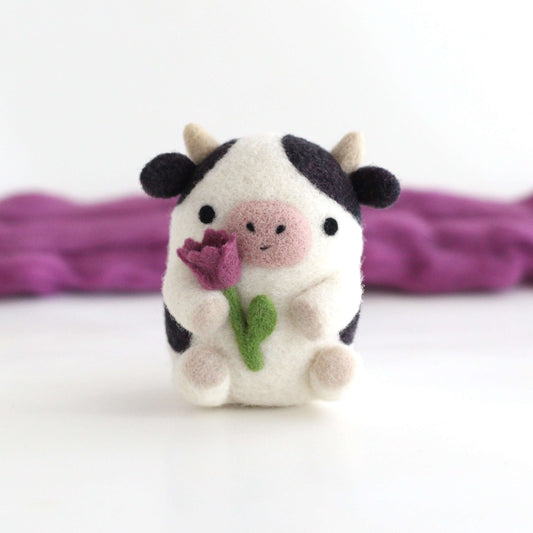 Needle Felted Cow holding Tulip