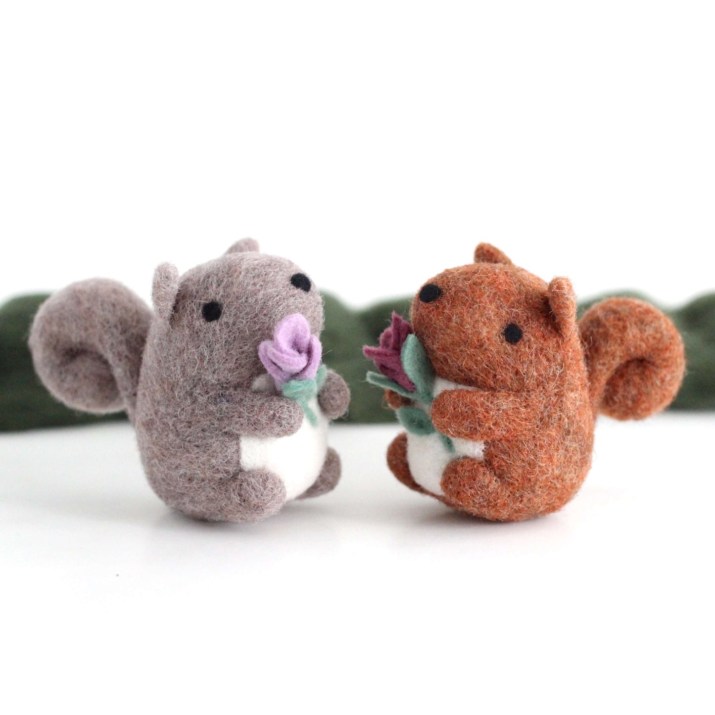 Needle Felted Grey Squirrel holding a Flower