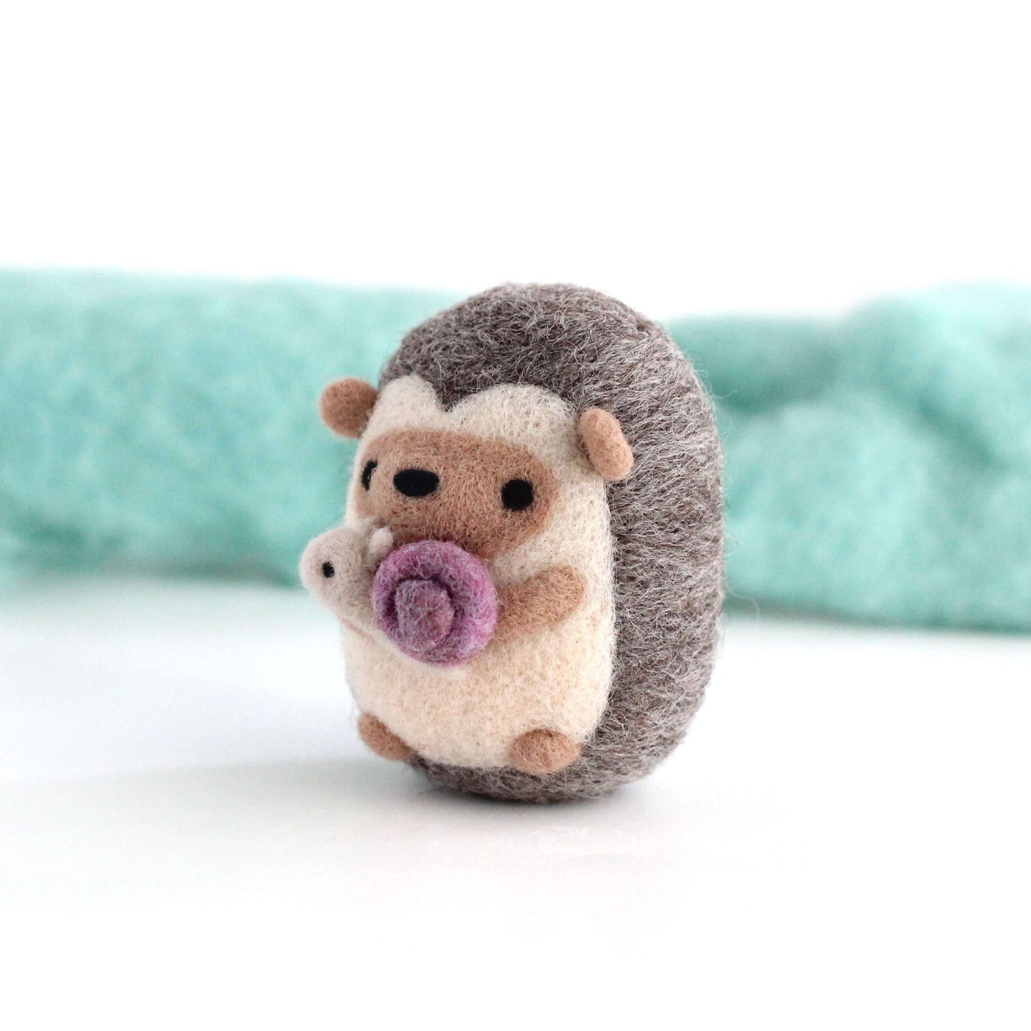 Needle Felted Hedgehog holding Snail by Wild Whimsy Woolies