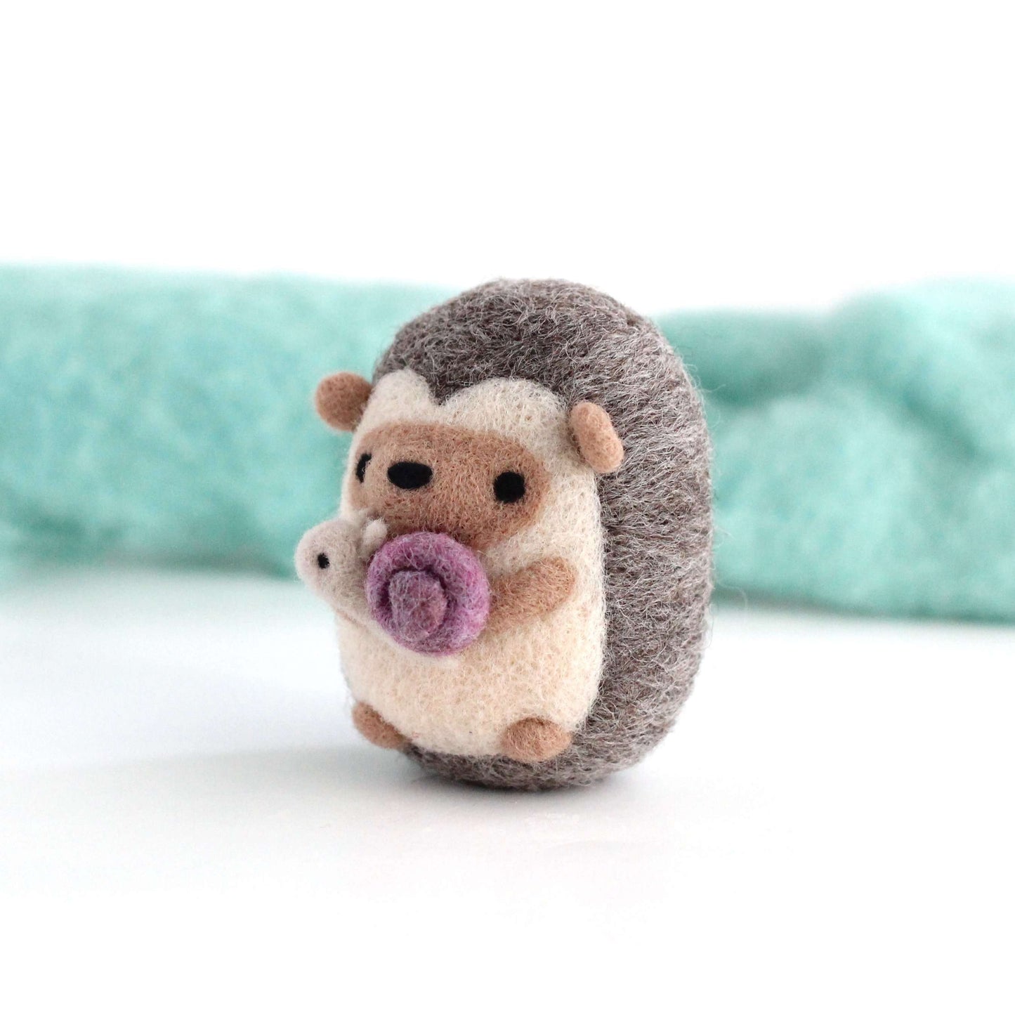 Needle Felted Hedgehog holding Snail