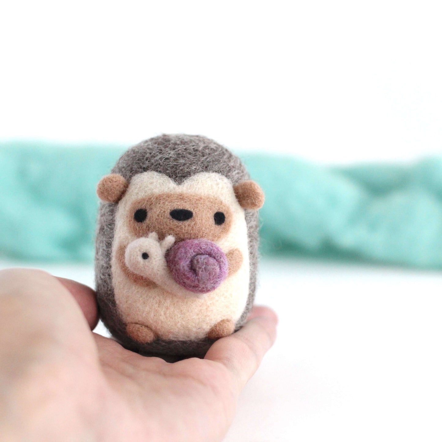 Needle Felted Hedgehog holding Snail