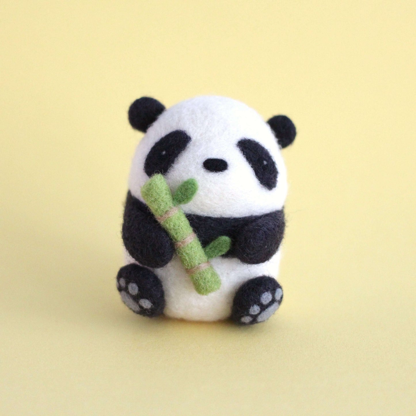 Needle Felted Panda holding Bamboo