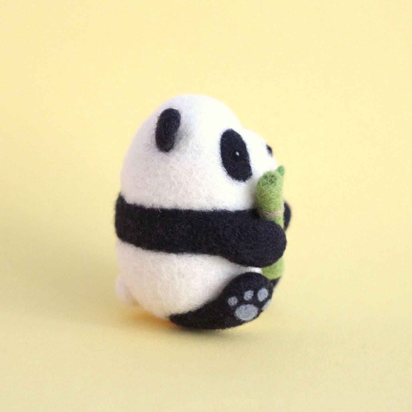 Needle Felted Panda holding Bamboo