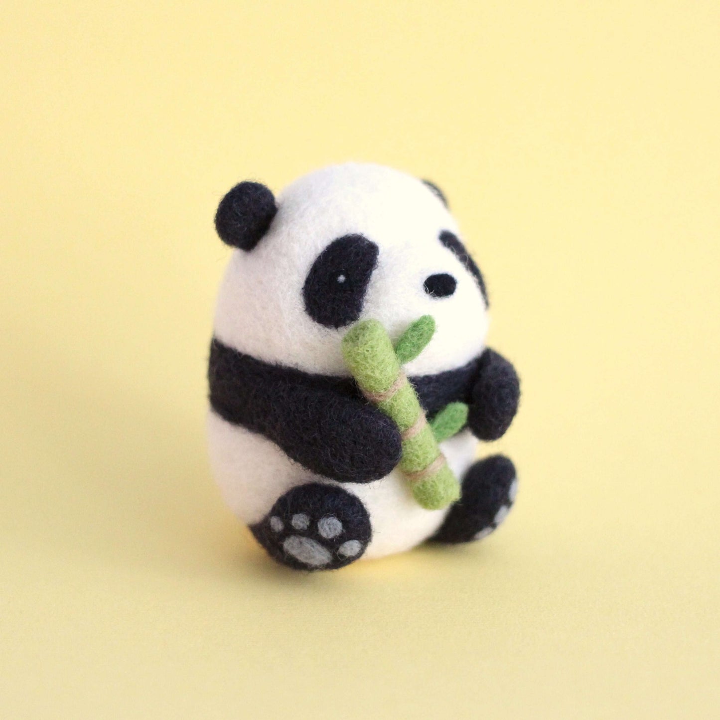 Needle Felted Panda holding Bamboo