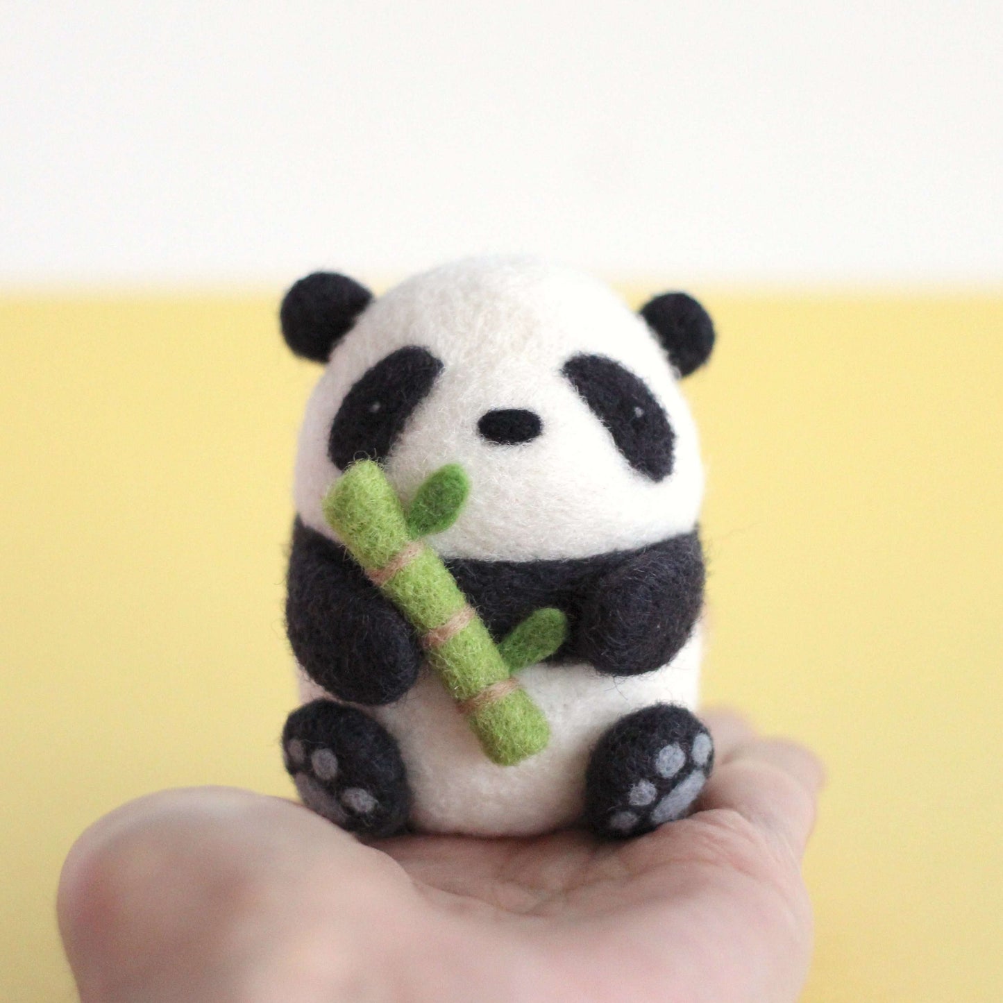 Needle Felted Panda holding Bamboo