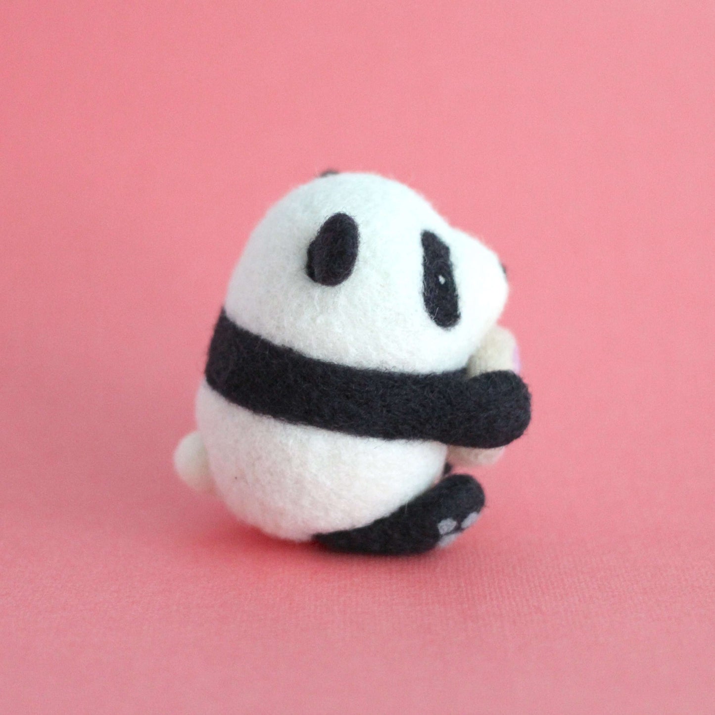 Needle Felted Panda holding Donut