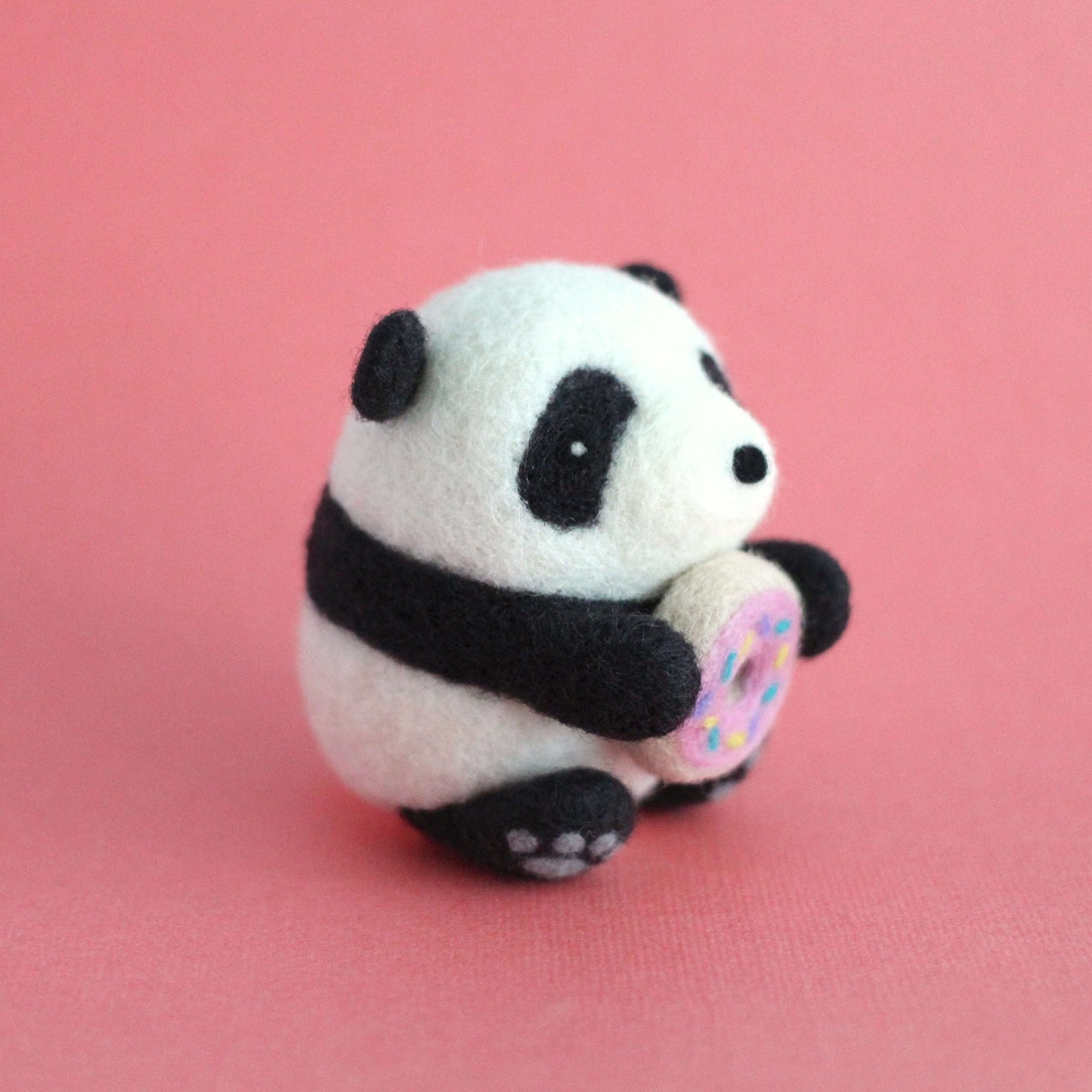 Needle Felted Panda holding Donut