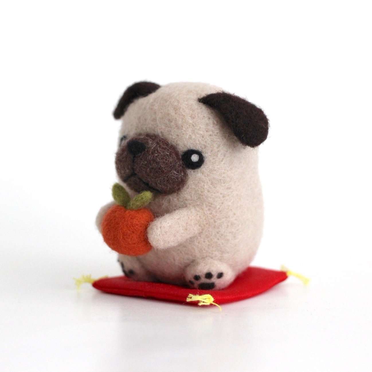 Needle Felted Pug with an Orange