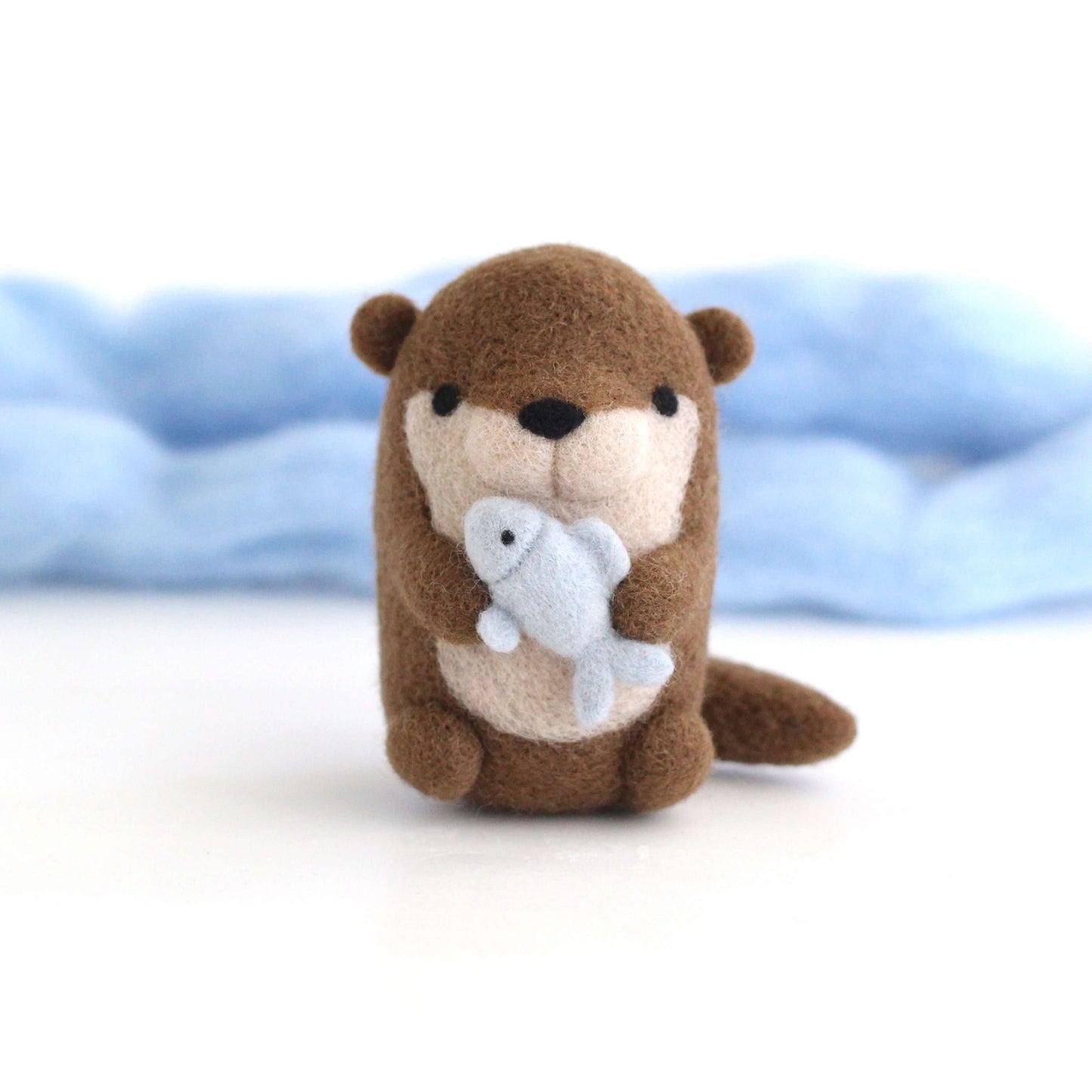 Needle Felted River Otter holding Fish by Wild Whimsy Woolies