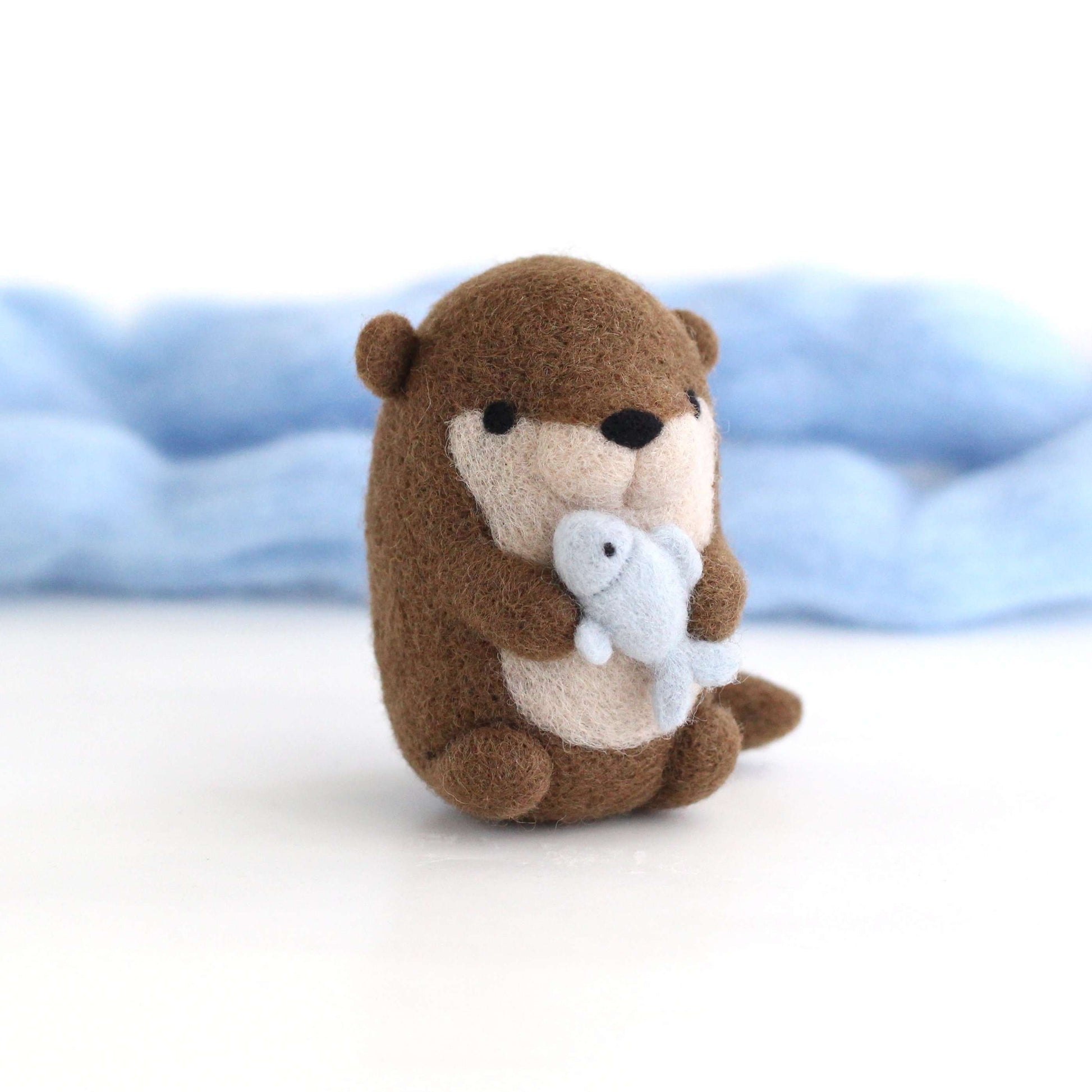 Needle Felted River Otter holding Fish by Wild Whimsy Woolies