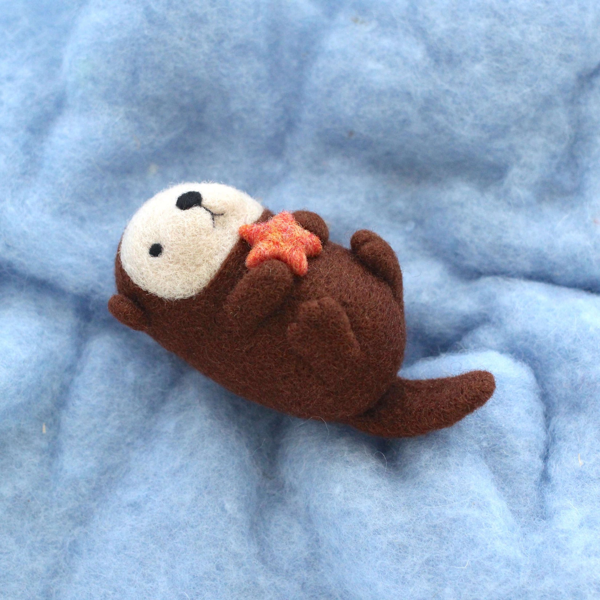 Needle Felted Sea Otter holding Starfish by Wild Whimsy Woolies