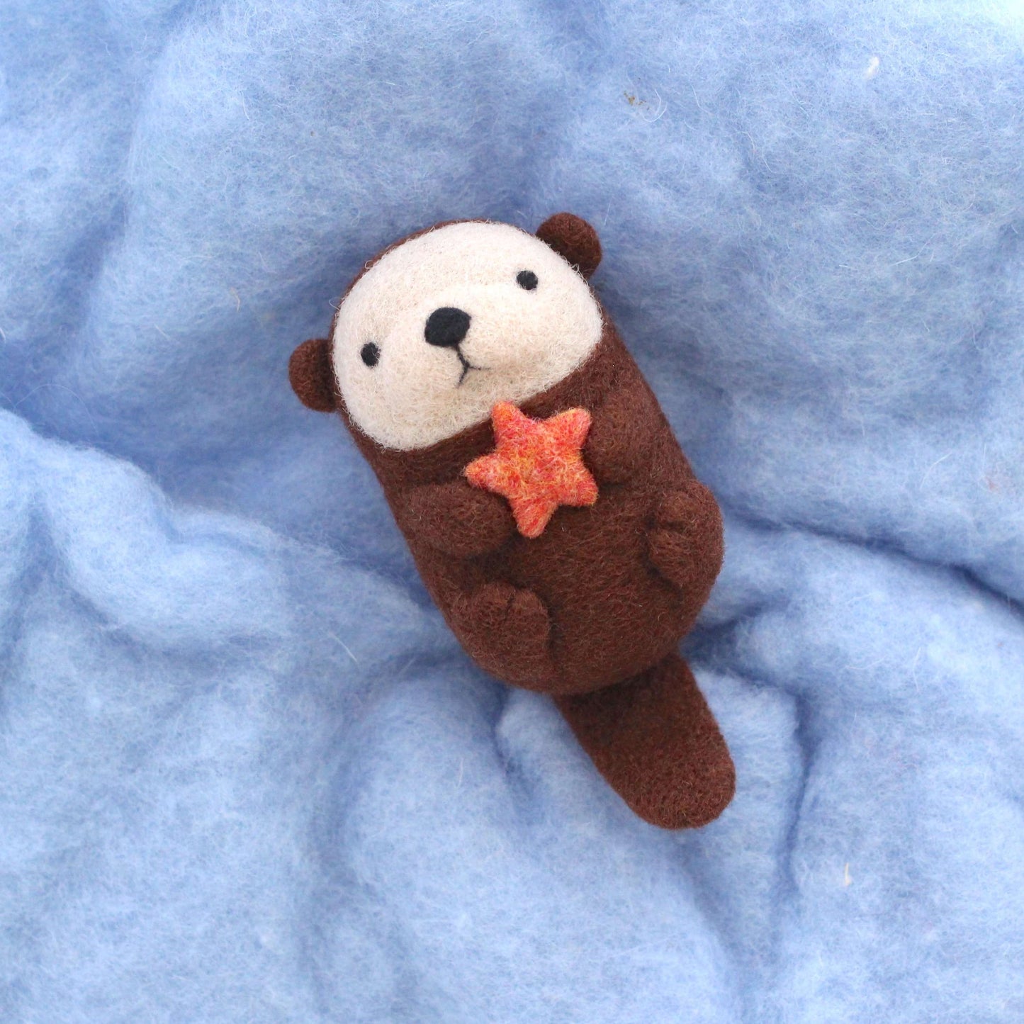 Needle Felted Sea Otter holding Starfish by Wild Whimsy Woolies