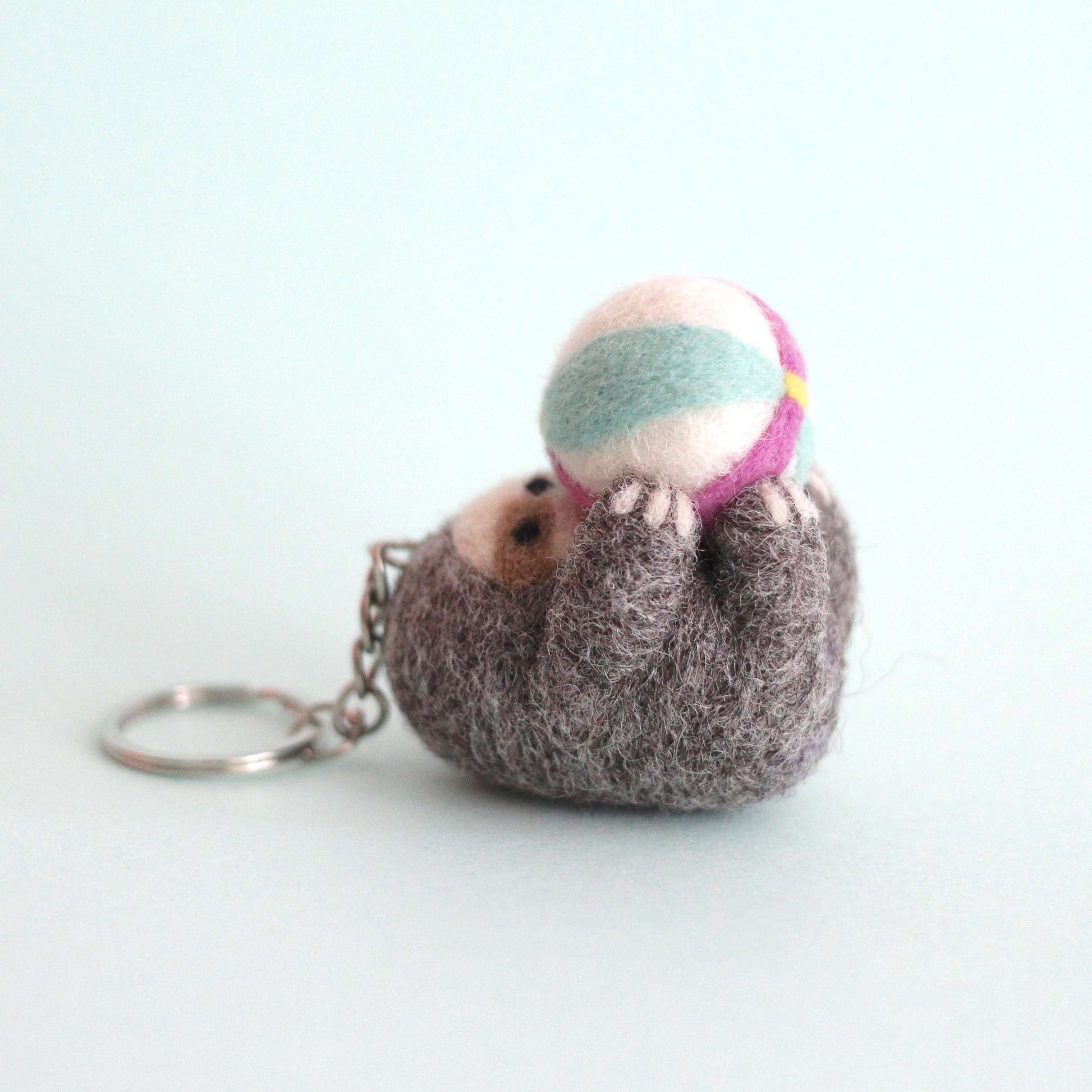 Needle Felted Sloth Holding a Beach Ball Keychain by Wild Whimsy Woolies