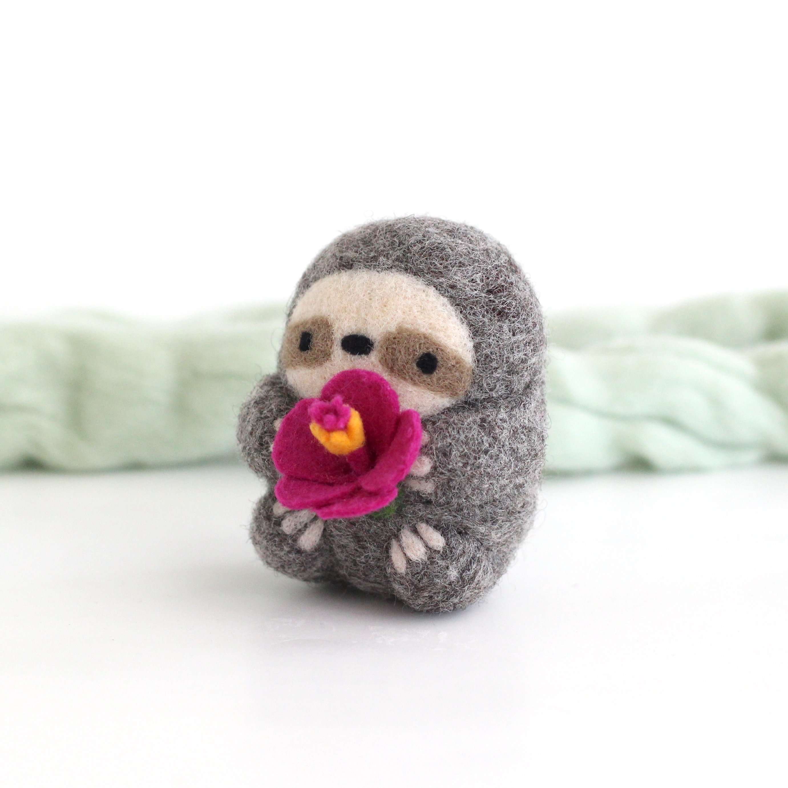 Needle Felted Sloth holding Hibiscus Flower – Wild Whimsy Woolies