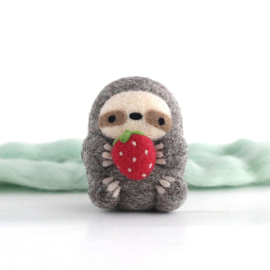 Needle Felted Sloth holding Strawberry