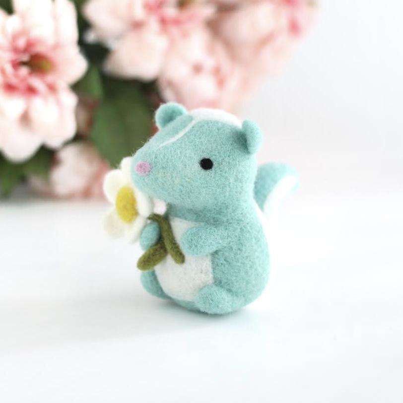 Needle Felted Turquoise Skunk with Daisy by Wild Whimsy Woolies